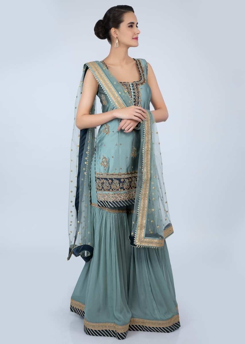 Turq green silk sharara suit set in floral embroidery and butti only on Kalki