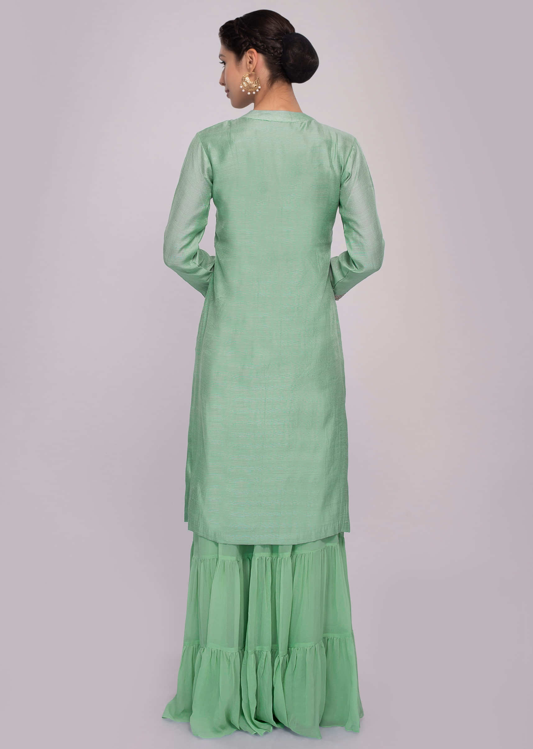 Turq green suit paired with matching sharara pant and chiffon dupatta 