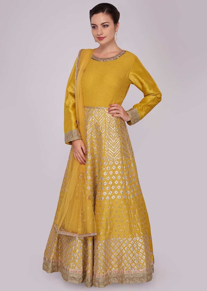 Tuscan yellow anarkali suit with kali embellished in gotta patch ...