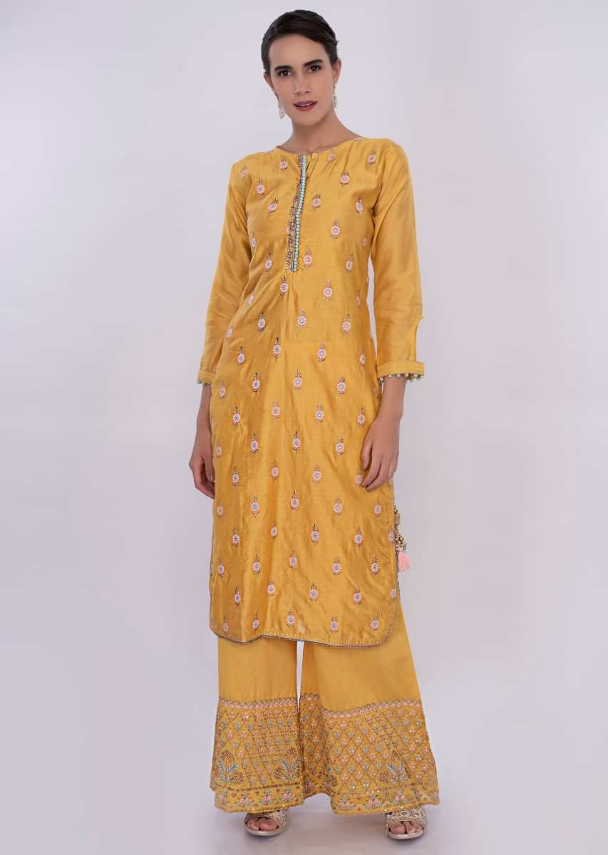 Tuscan yellow cotton silk palazzo suit  wit contrasting green net dupatta only on Kalki