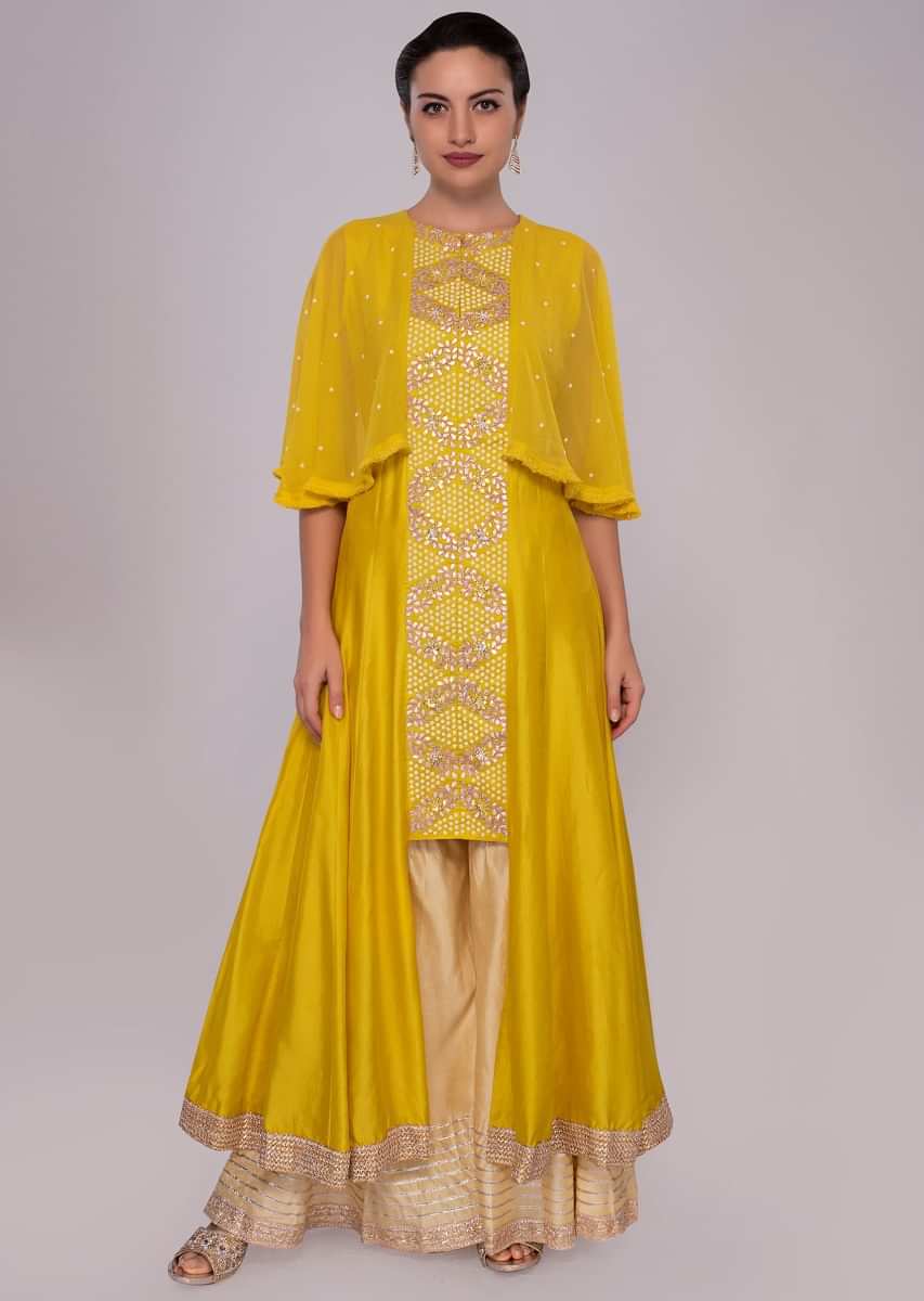 Tuscan yellow suit with additional chiffon layer paired with cream palazzo 