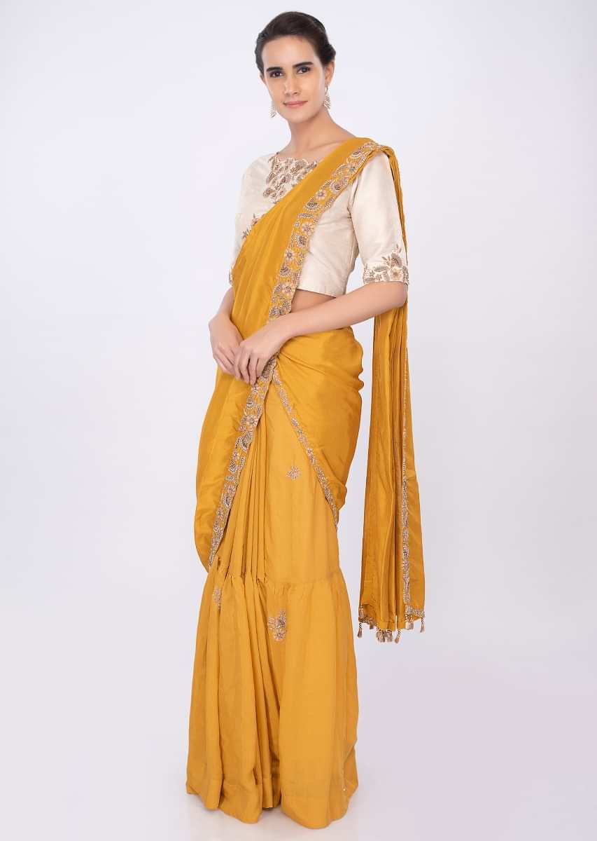 Mustard Two Pieced Saree With Cream High Neck Blouse Online - Kalki Fashion