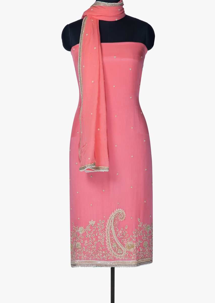 Unstitched suit in pink with hem line in sequin and moti embroidery only on Kalki