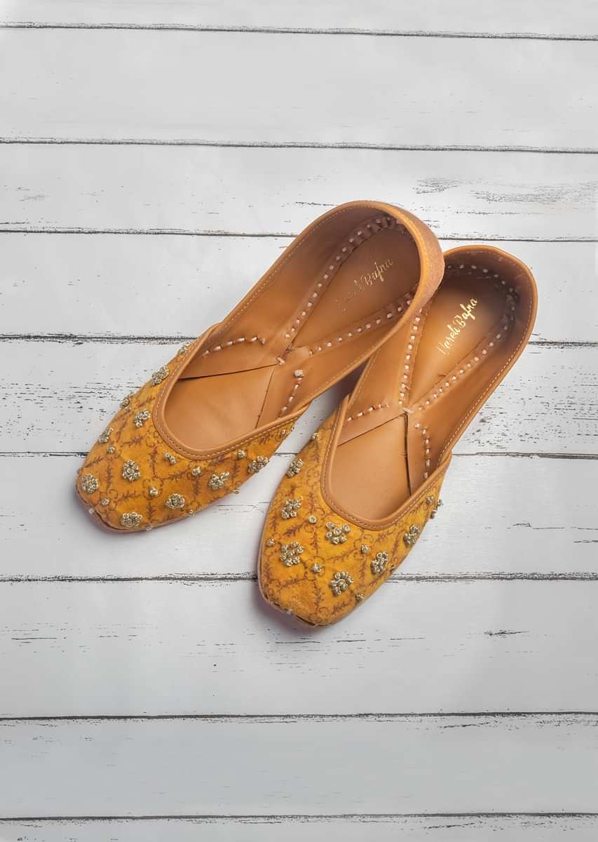 Mustard Yellow Juttis In Customized Moroccan Printed Linen With French Knot Embroidery By Vareli Bafna