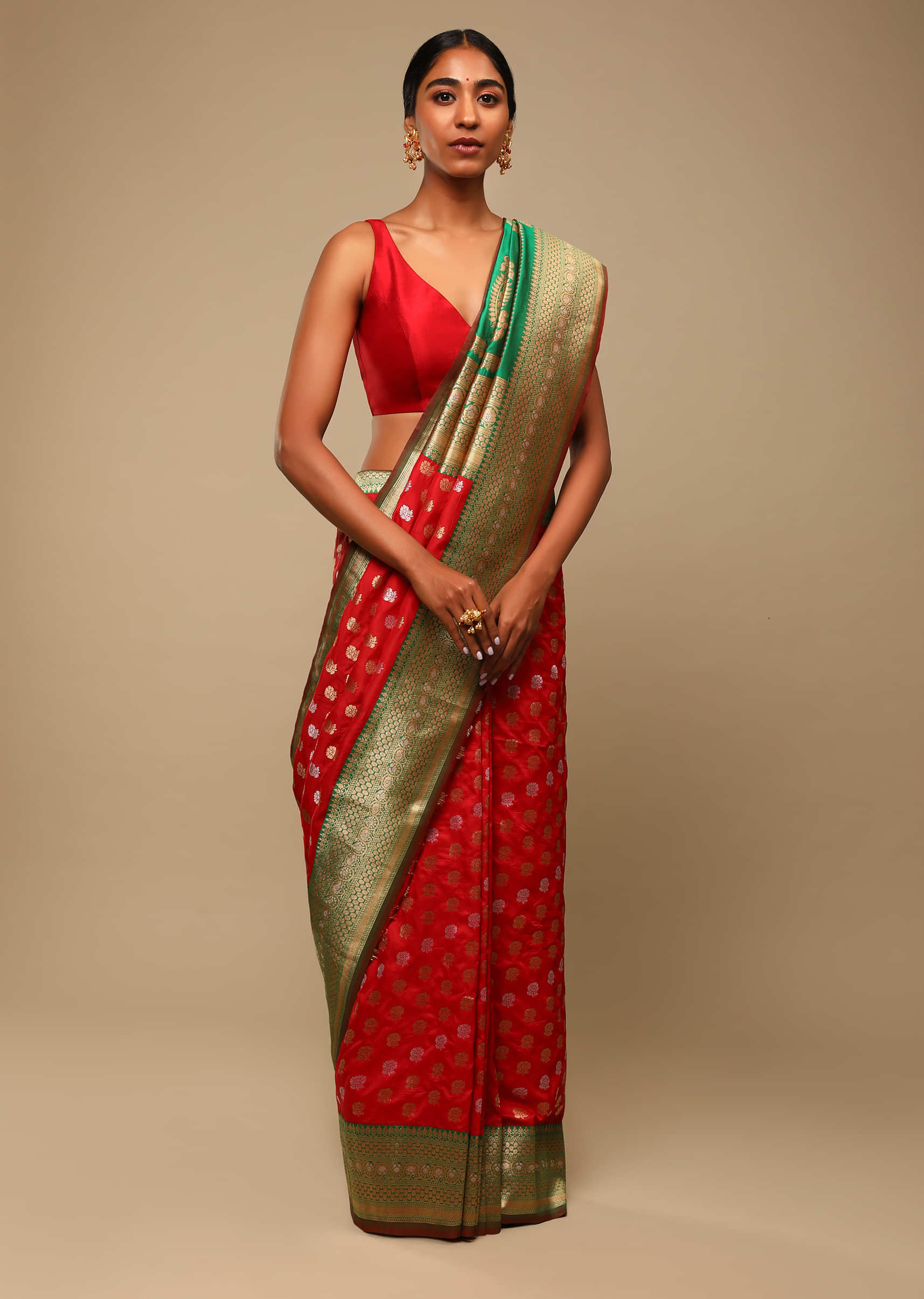 Vermillion Red Saree In Art Handloom Silk With Green Woven Border And Two Toned Buttis Along With Unstitched Blouse  