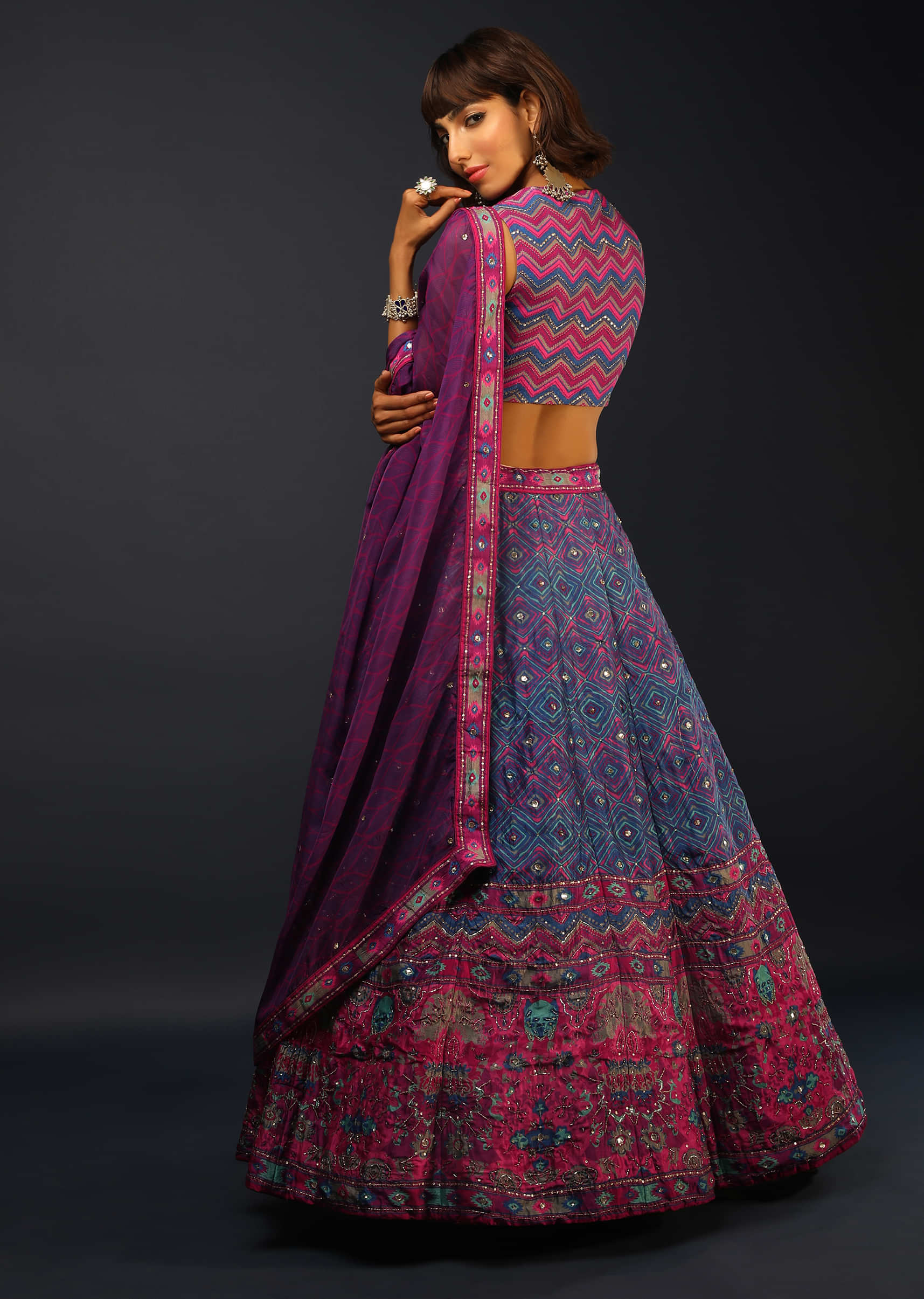 Victoria Blue Lehenga Choli In Silk With Tie Dye Print And Pink Patola Border 