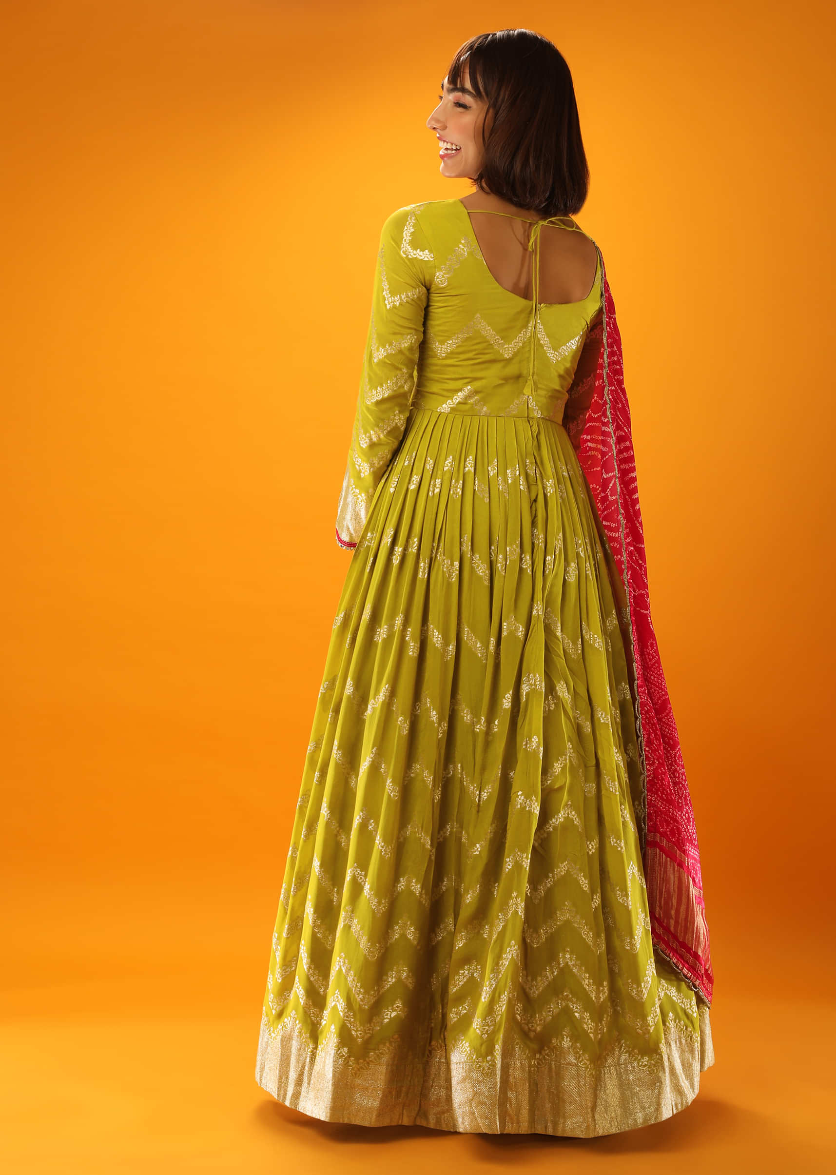 Warm Olive Anarkali Suit With Lurex Woven Chevron Design And Red Bandhani Dupatta  