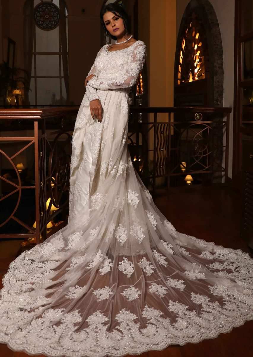 White ballroom gown with centre frills and pleats