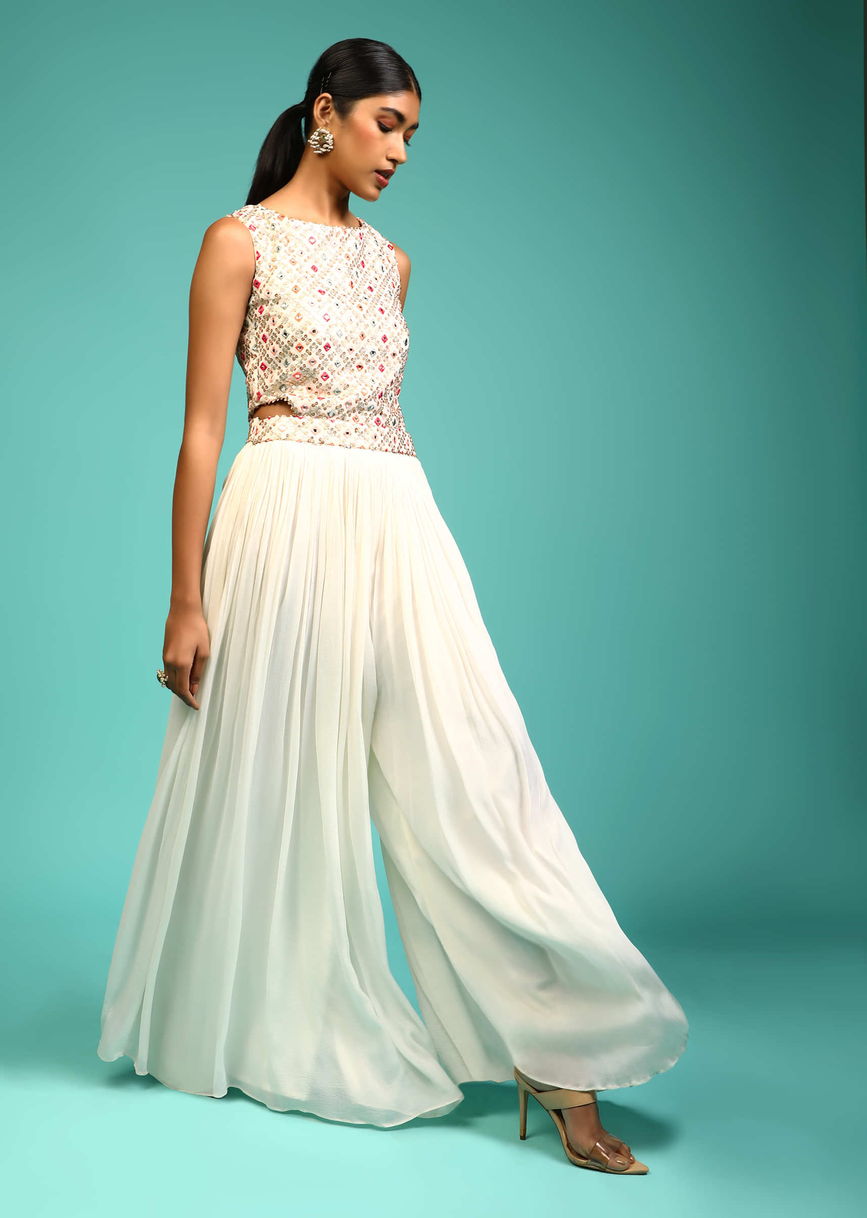 White Jumpsuit In Chiffon With Multi Colored Resham And Mirror Embroidered Bodice Along With Side Cut Outs  