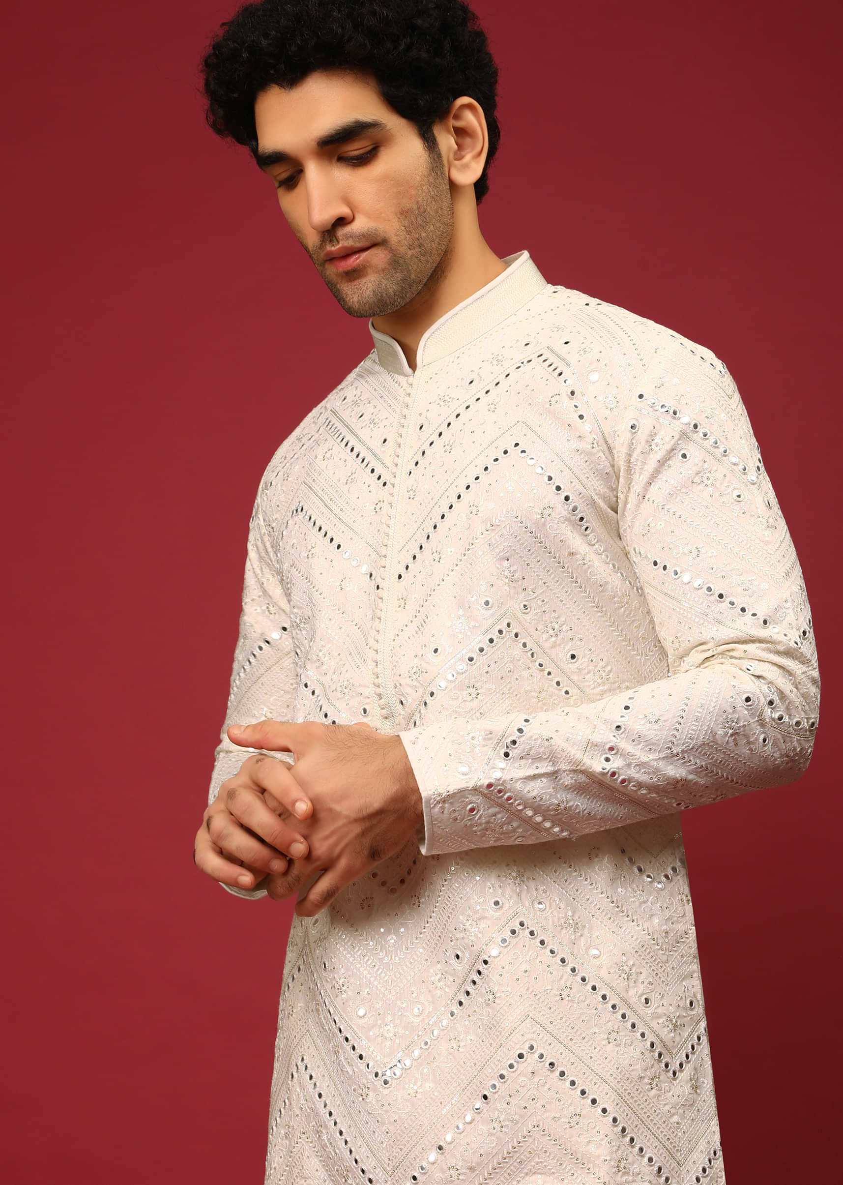 White Kurta Set In Raw Silk Heavily Embroidered With Resham And Mirror Embroidery In Floral And Chevron Design
