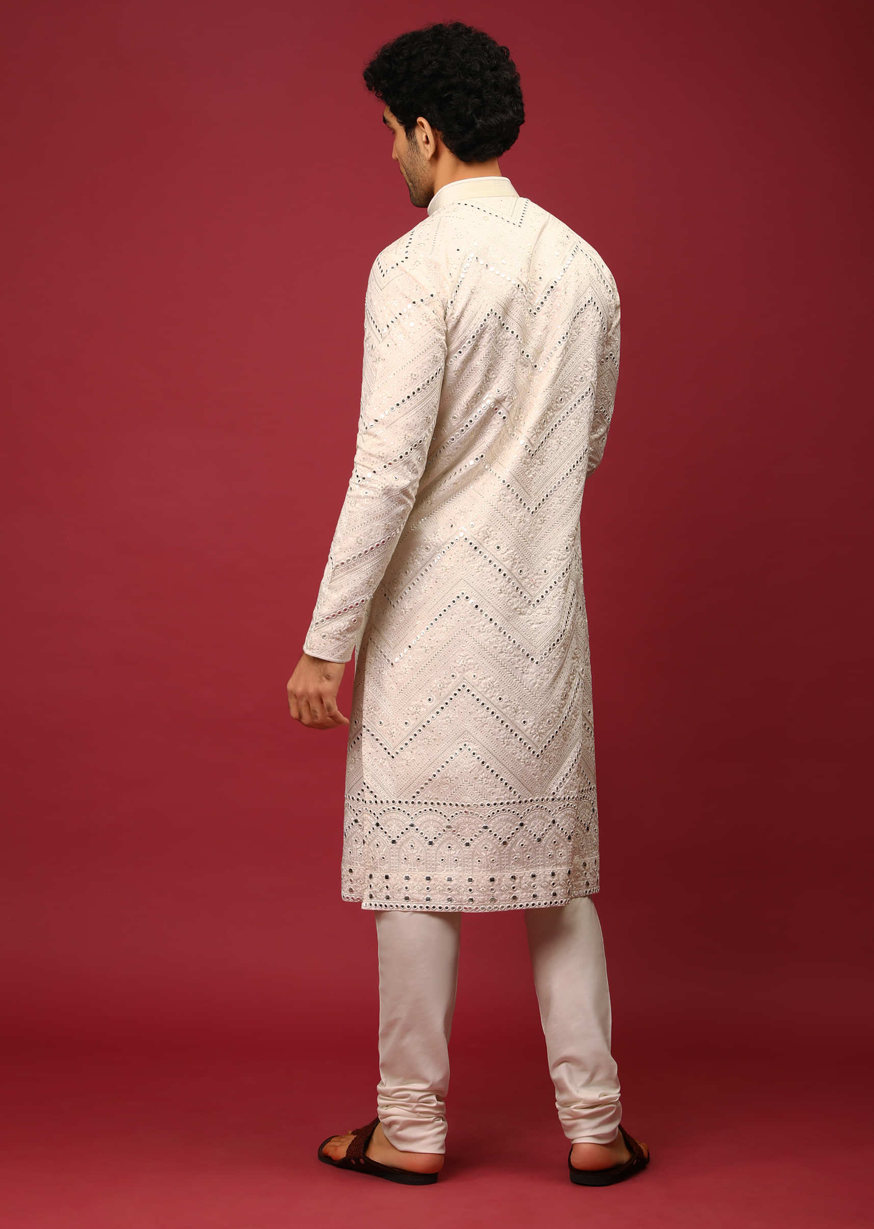 White Kurta Set In Raw Silk Heavily Embroidered With Resham And Mirror Embroidery In Floral And Chevron Design