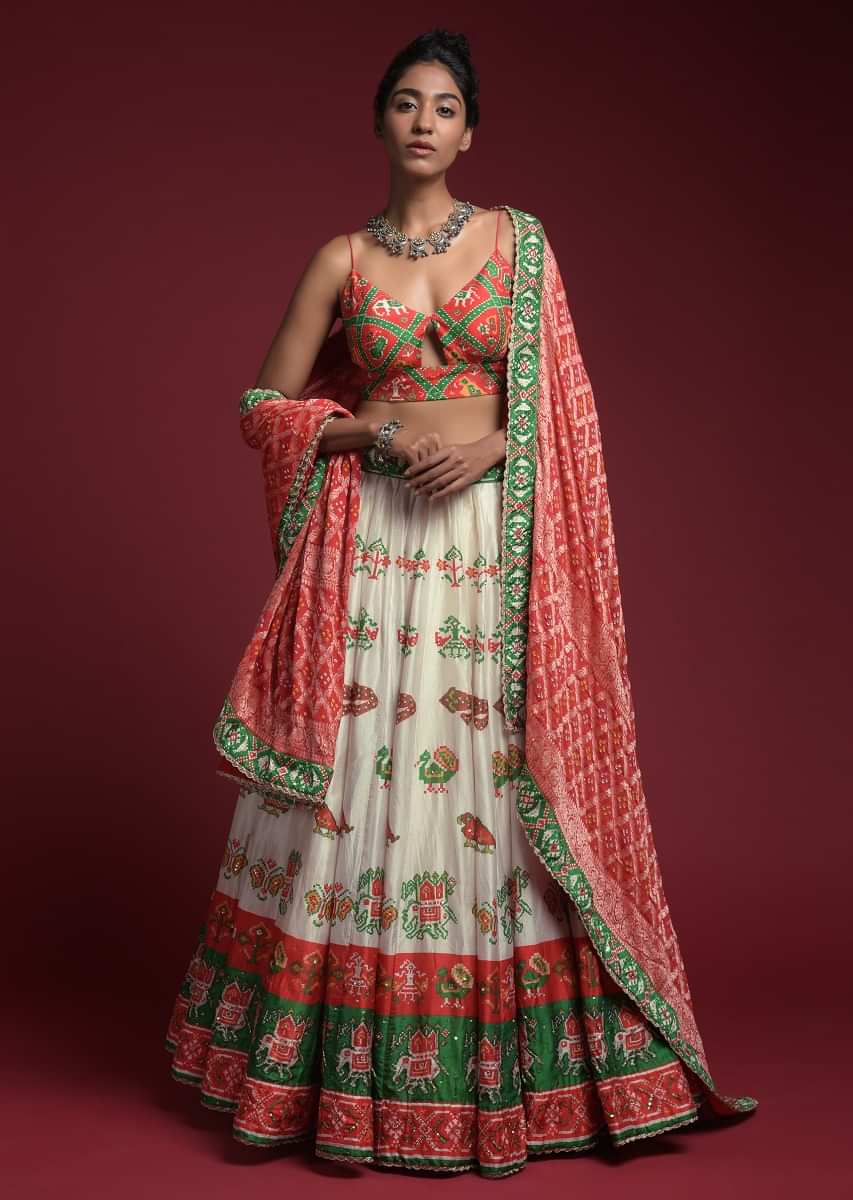Buy White Lehenga In Silk With Red And Green Patola Printed Buttis And Border Along With