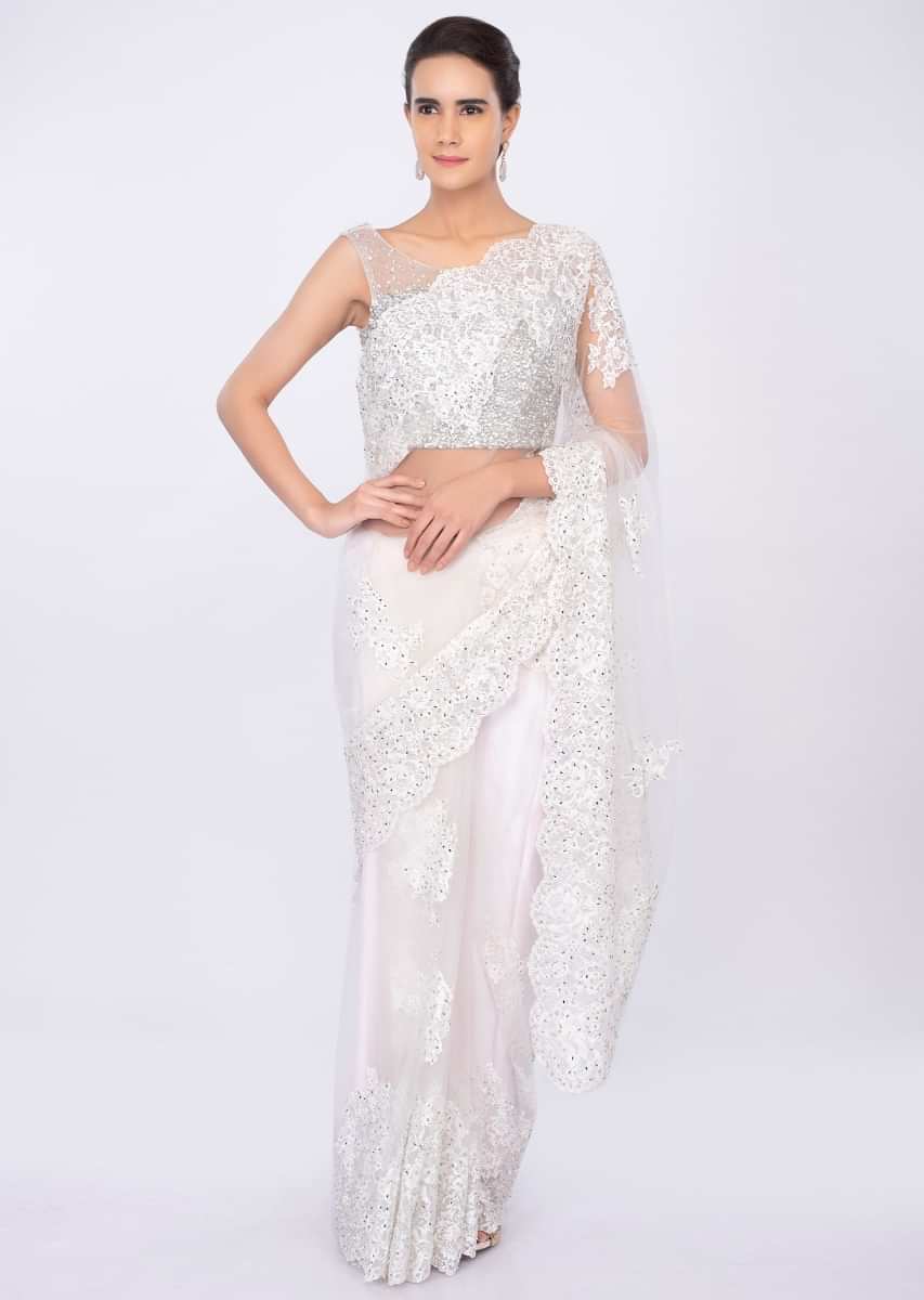 White Saree In Net With Chantlilly Lace Buttiand Border Online - Kalki Fashion
