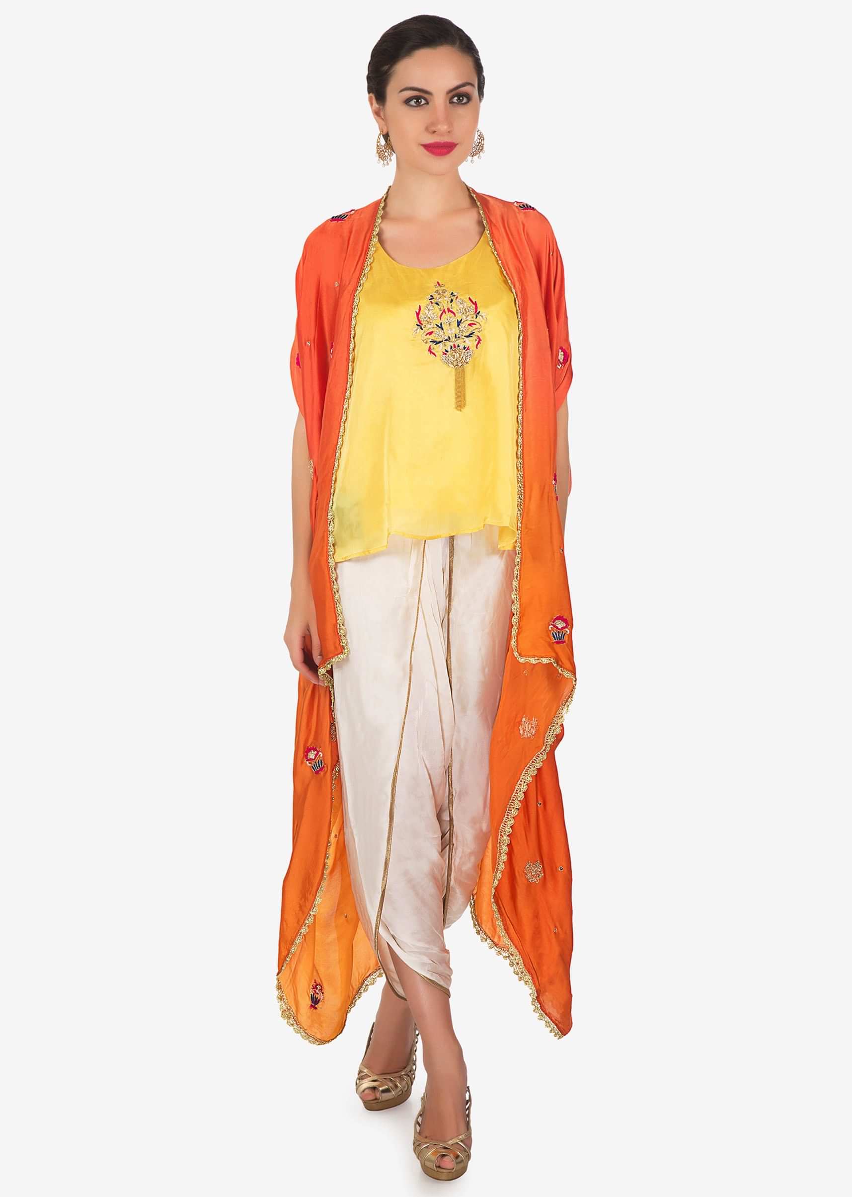 White and yellow dhoti set featuring with embroidered butti and shaded jacket only on Kalki