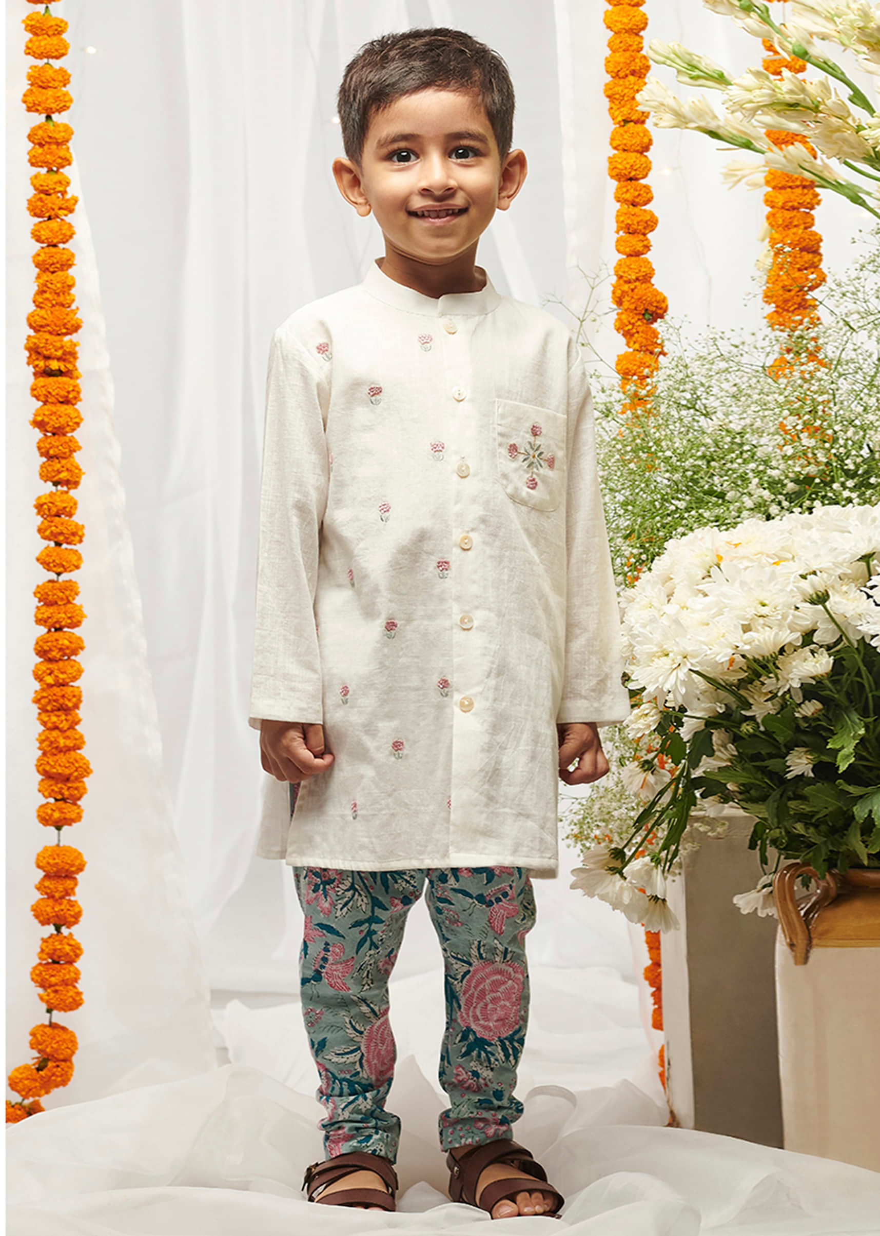 Kalki Boys White Kurta Set In Cotton With Embroidered Buttis And Floral Printed Churidar By Tiber Taber