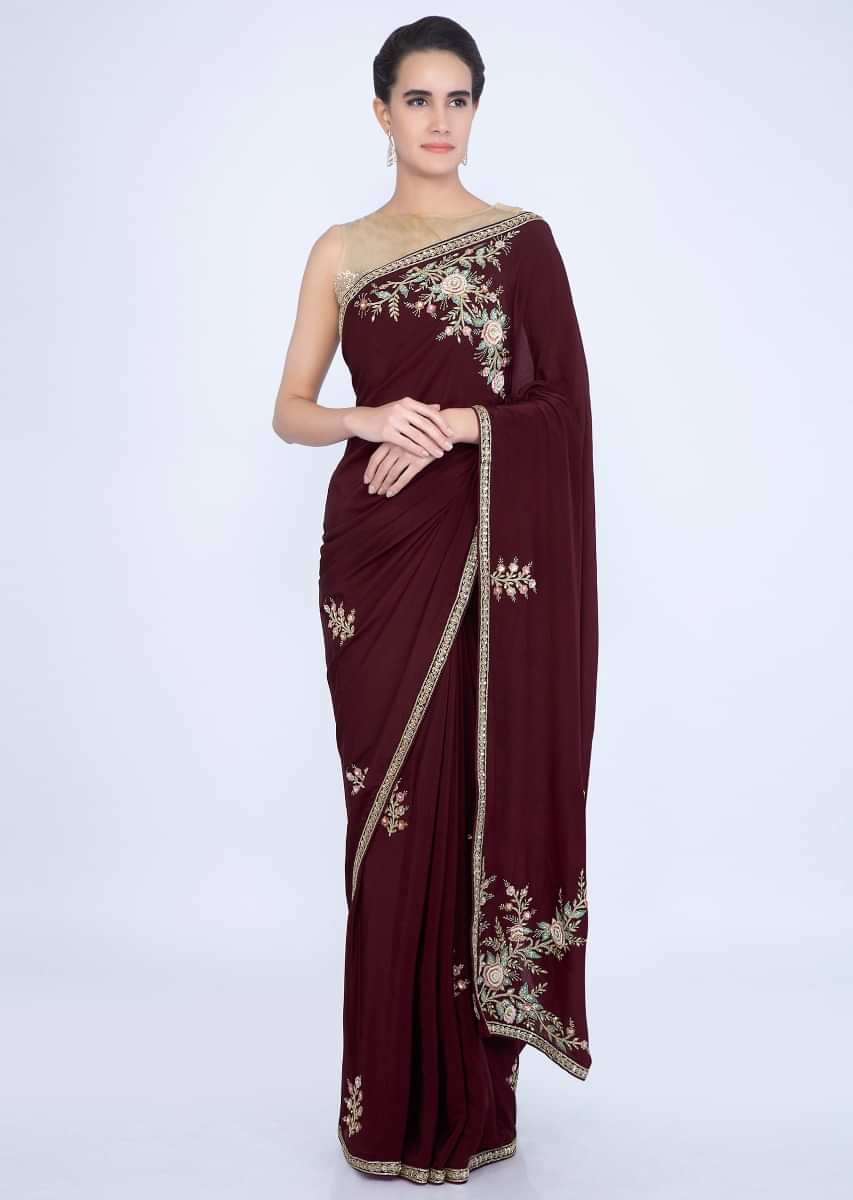 Wine crepe silk saree with embroidered butti and border only on Kalki