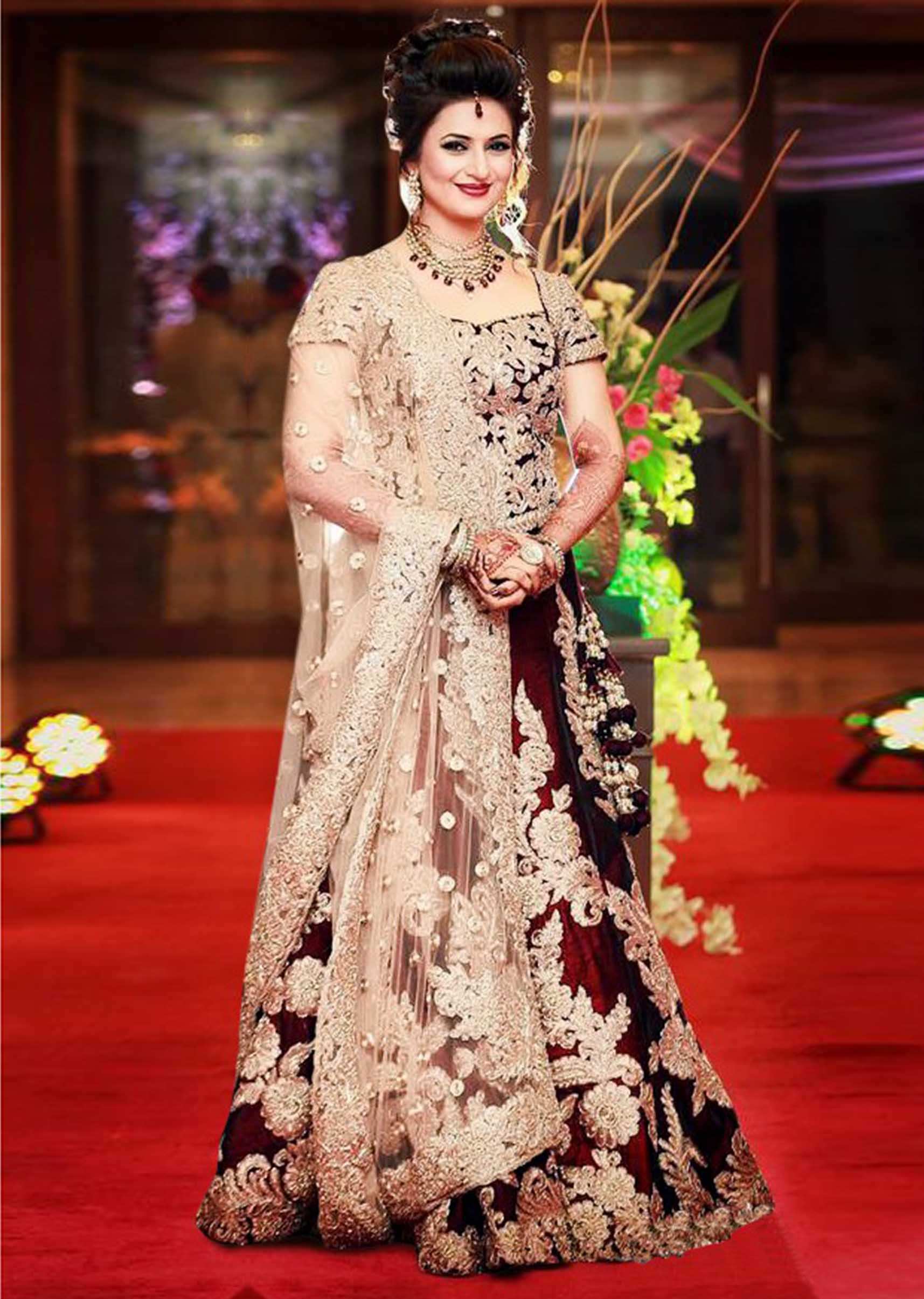 Divyanka Tripathi in kalki maroon lehenga at her reception