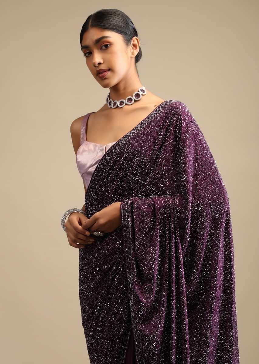 Wine Saree In Satin With A Heavy Embellished Pallu Using Scattered Sequins And Unstitched Blouse  