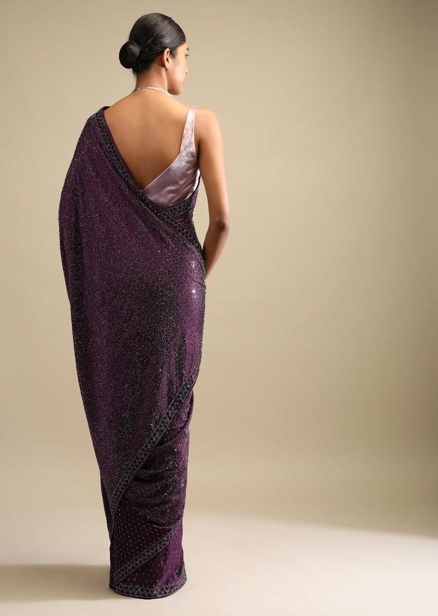 Wine Saree In Satin With A Heavy Embellished Pallu Using Scattered Sequins And Unstitched Blouse  