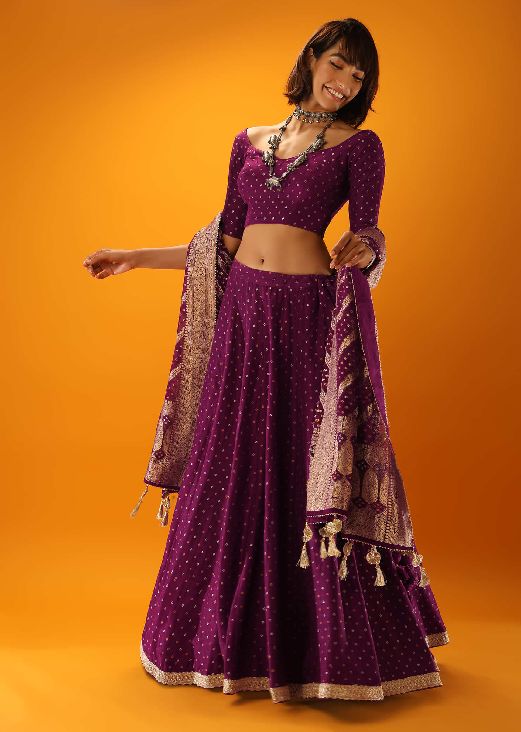 Wine Purple Lehenga In Brocade Silk With Woven Bandhani Design And Unstitched Blouse 