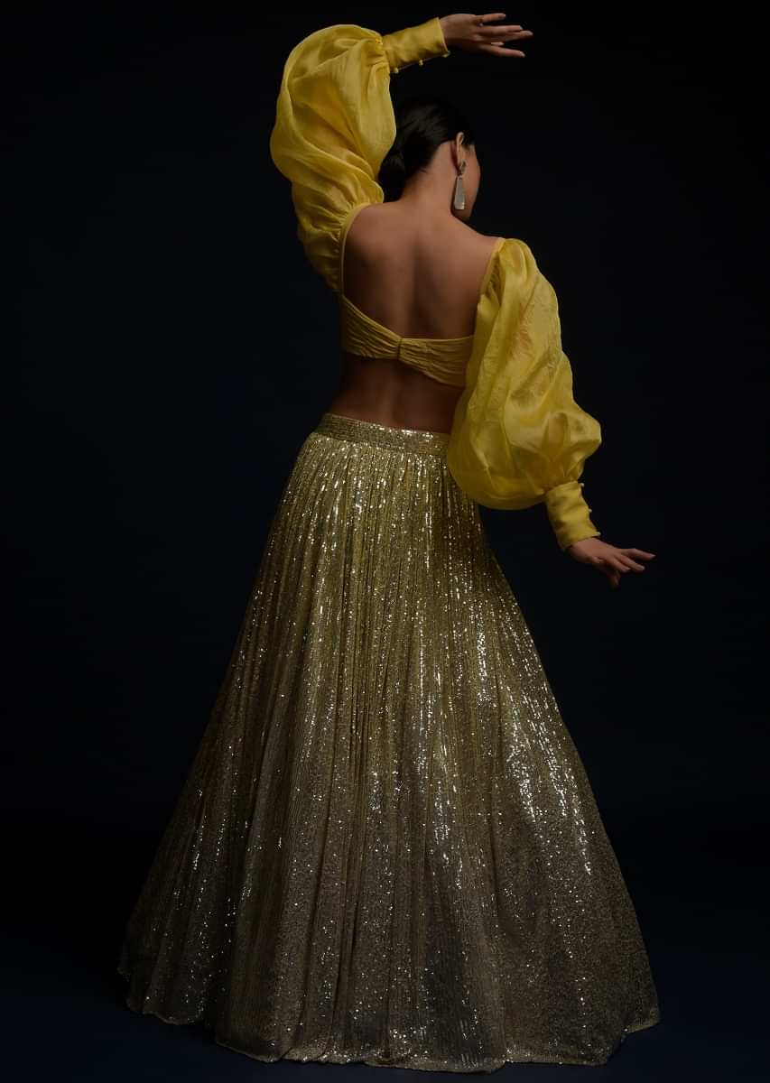 Yellow And Silver Ombre Lehenga Embellished In Sequins And Matching Organza Blouse With Fancy Puffed Sleeves