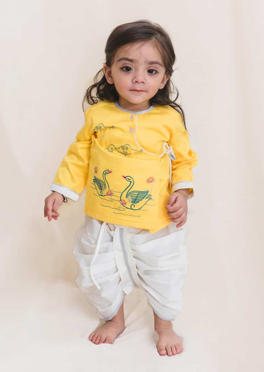 Kalki Boys Yellow Kurta And White Dhoti Set In Cotton With Thread And Zari Embroidered Swan Motifs By Tiber Taber