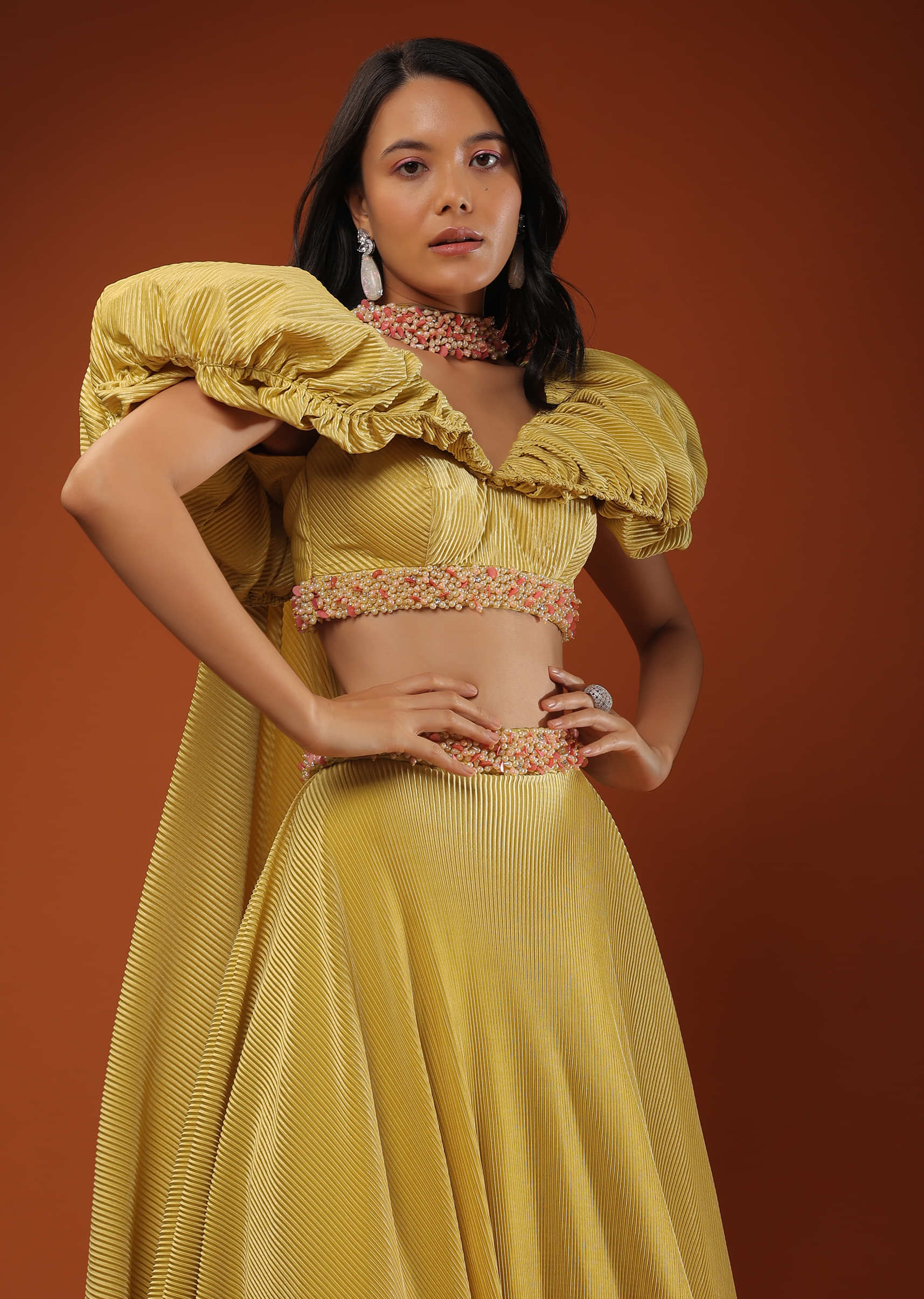 Yellow Crush Lehenga And A Crop Top In Moti Embroidery, Crop Top Comes In Balloon Sleeves Till The Yoke