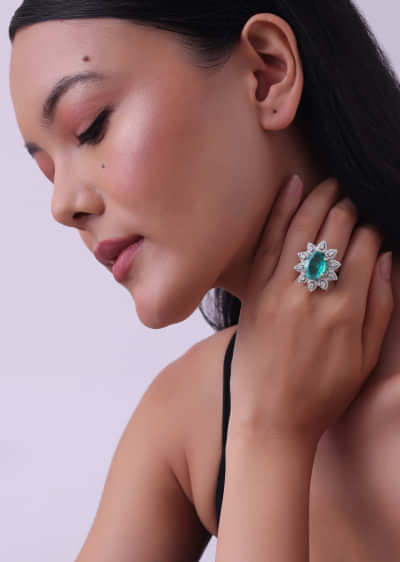 92.5 Sterling Silver Flower Shaped Ring Studded With Oval-Shaped Green Synthetic Stone 