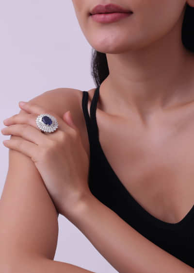 92.5 Sterling Silver Ring Studded With Lab Diamonds And A Round Sapphire Blue Stone