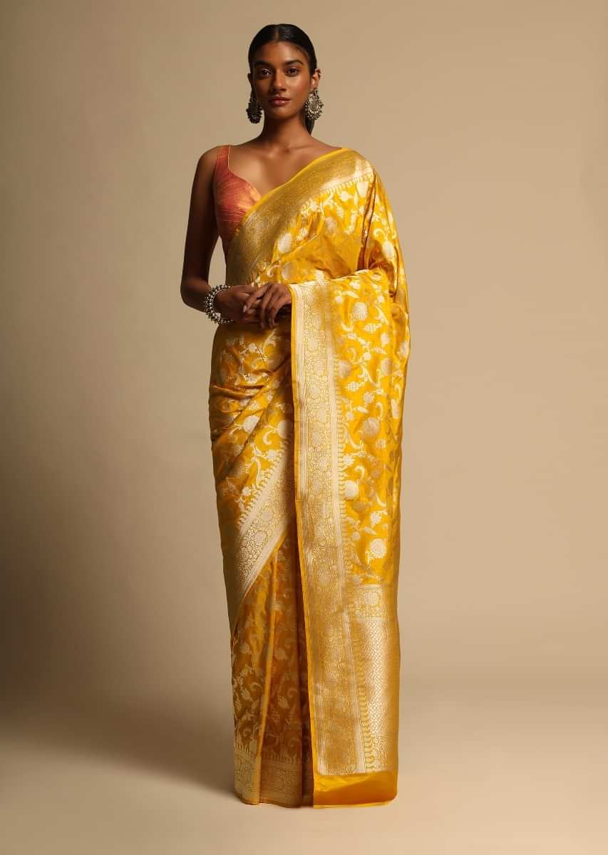 Amber Yellow Banarasi Saree In Pure Handloom Silk With Woven Floral Jaal And Floral Border Along With Unstitched Blouse Piece