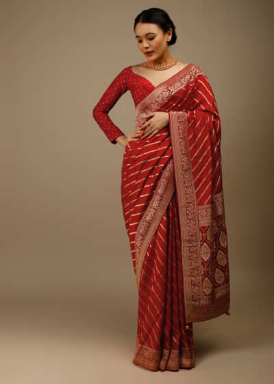 Apple Red Saree In Silk With Diagonal Stripes And Red Brocade Bandhani Pallu And Border Along With Unstitched Blouse 