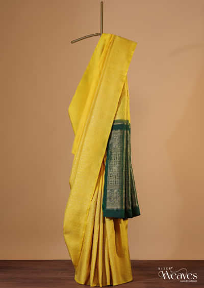 Canary Yellow Kanjivaram Silk Sari With Gold Weave And Unstitched Blouse