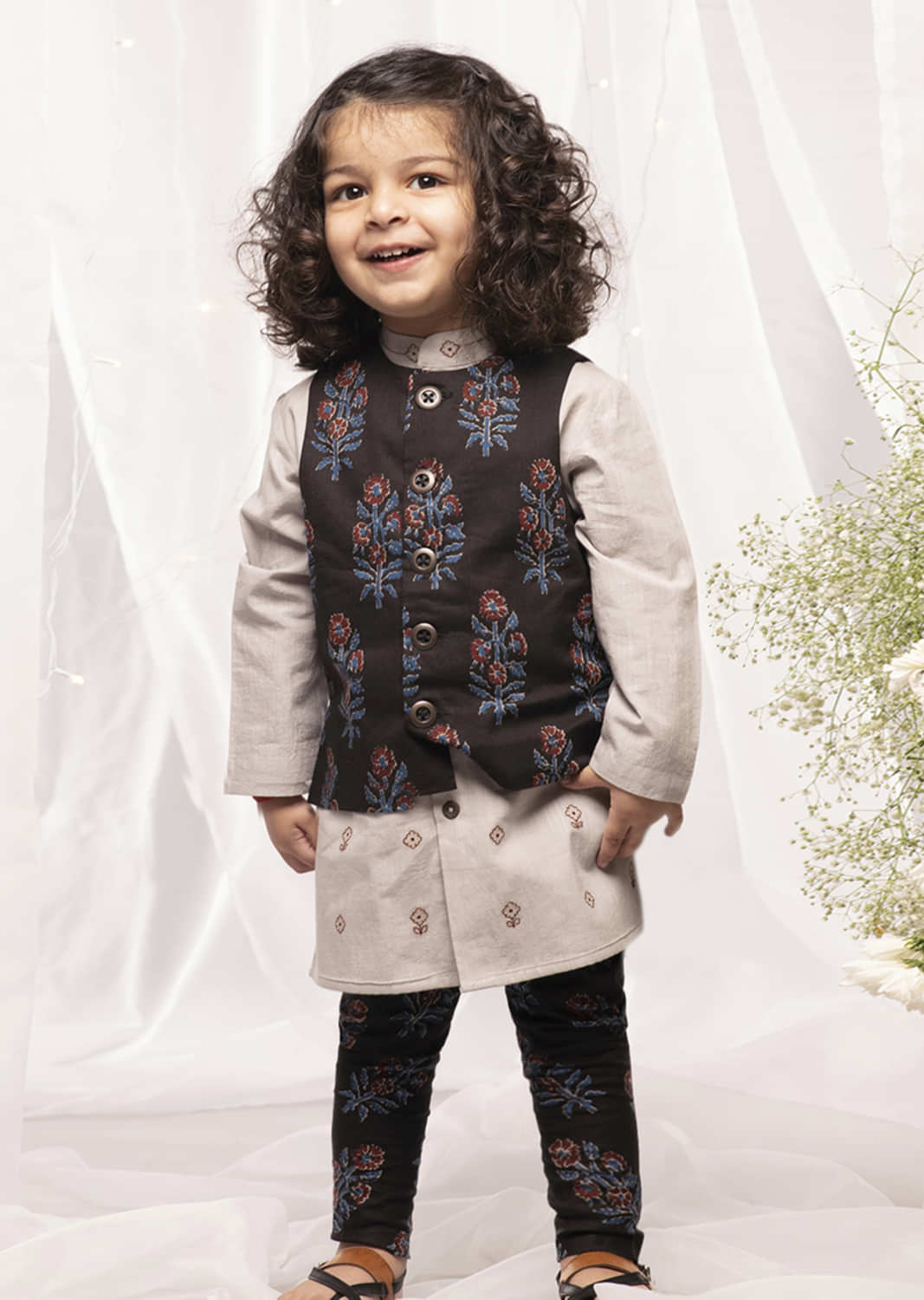 Kalki Boys Black Nehru Jacket And Kurta Set With Floral Print And Embroidery Detailing By Tiber Taber