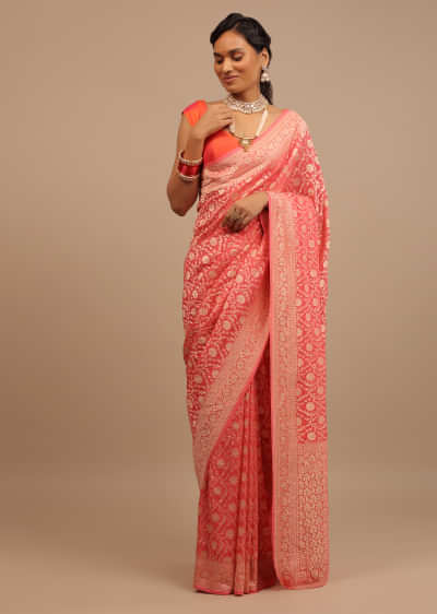 Coral Pink Saree In A Traditional Silhouette In Georgette With Floral Jaal Work