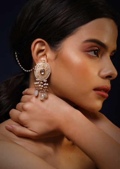 Cream Minakari Earrings In Oval Motif With Kundan And Dangling Moti And White Drop Fringes