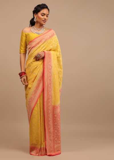 Daffodil Yellow With Heavy Woven Brocade Work All Over And On The Pink Border And Pallu