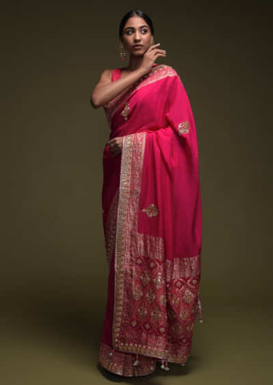 Magenta Pink Saree In Crepe Silk With Woven Floral Border And Gotta Patti Embroidered Floral Motifs   