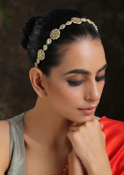 Gold Plated Headband With Uncut Polki Arranged In Floral Motifs Along With Moti Detailing On The Edges By Paisley Pop