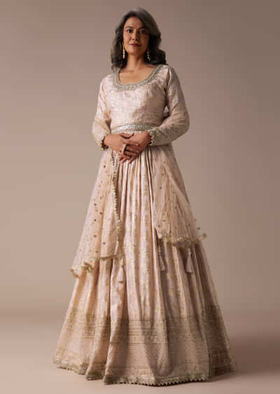Cream White Anarkali Suit With Floral Brocade Weave And Mirror Embroidery