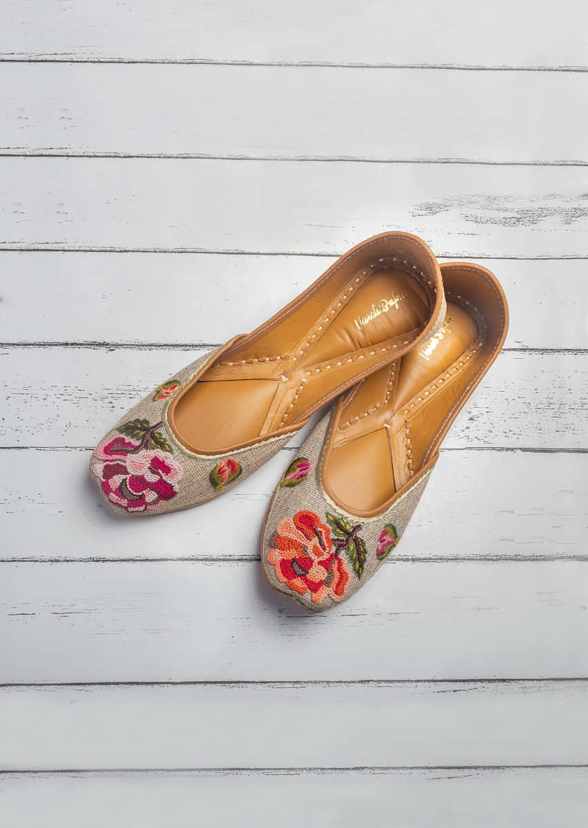 Beige Juttis In Jutti Fabric With Colorful French Knots Flowers By Vareli Bafna