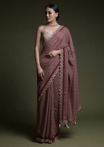 Maroon Saree In Soft Silk With Printed Floral Buttis, Scalloped Gotta Patti Border And Unstitched Blouse  