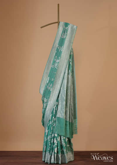 Sea Green Handloom Saree In Tissue Georgette With Zari Weave And An Unstitched Blouse