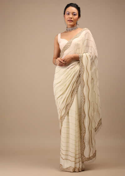Off White Georgette Saree With Cut Dana Zardosi Embroidery Along With Copper Detailing 