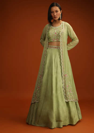 Pastel Green Lehenga Choli In Raw Silk With Hand Embroidery And Full Sleeves Organza Jacket