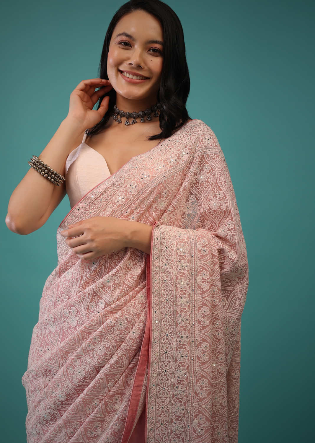 Peach Georgette Saree In Lucknowi Threadwork In A Moroccan Jaal, It Has Sequins, Cut Dana Embroidery Buttis On The Pallu 