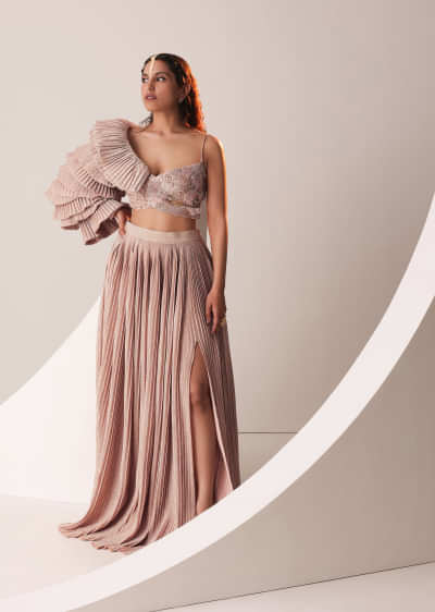 Peach Gold Embroidered Skirt And Top Set In Knit Strechable Fabric