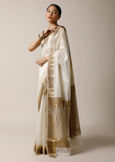 Pearl White Saree In Cotton Silk With Woven Golden Border And Contrasting Unstitched Blouse  