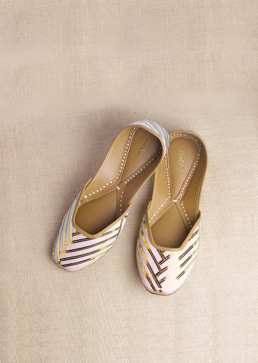 Pink Juttis In Raw Silk Adorned In Holographic Pu Applique In Geometric Motifs By Vareli Bafna