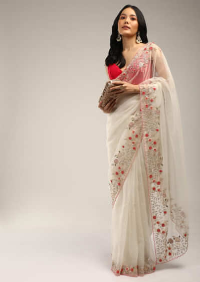 Powder White Saree In Organza With Colorful Resham Flowers On The Border Along With Moti And Cut Dana Accents  