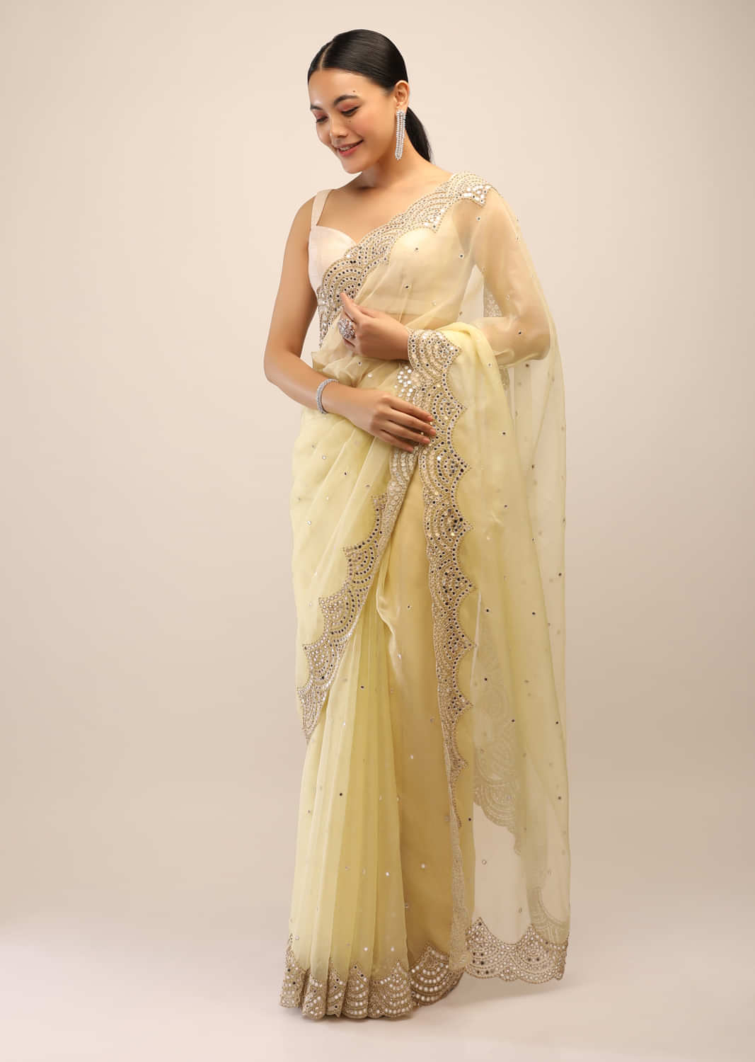 Powder Yellow Saree In Organza With Mirror Abla And Beads Embroidered Scallop Border And Buttis